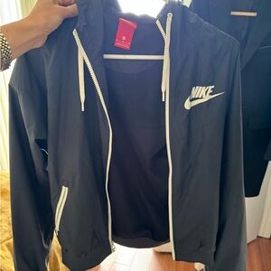 Nike women's Black Windbreaker with White Accents